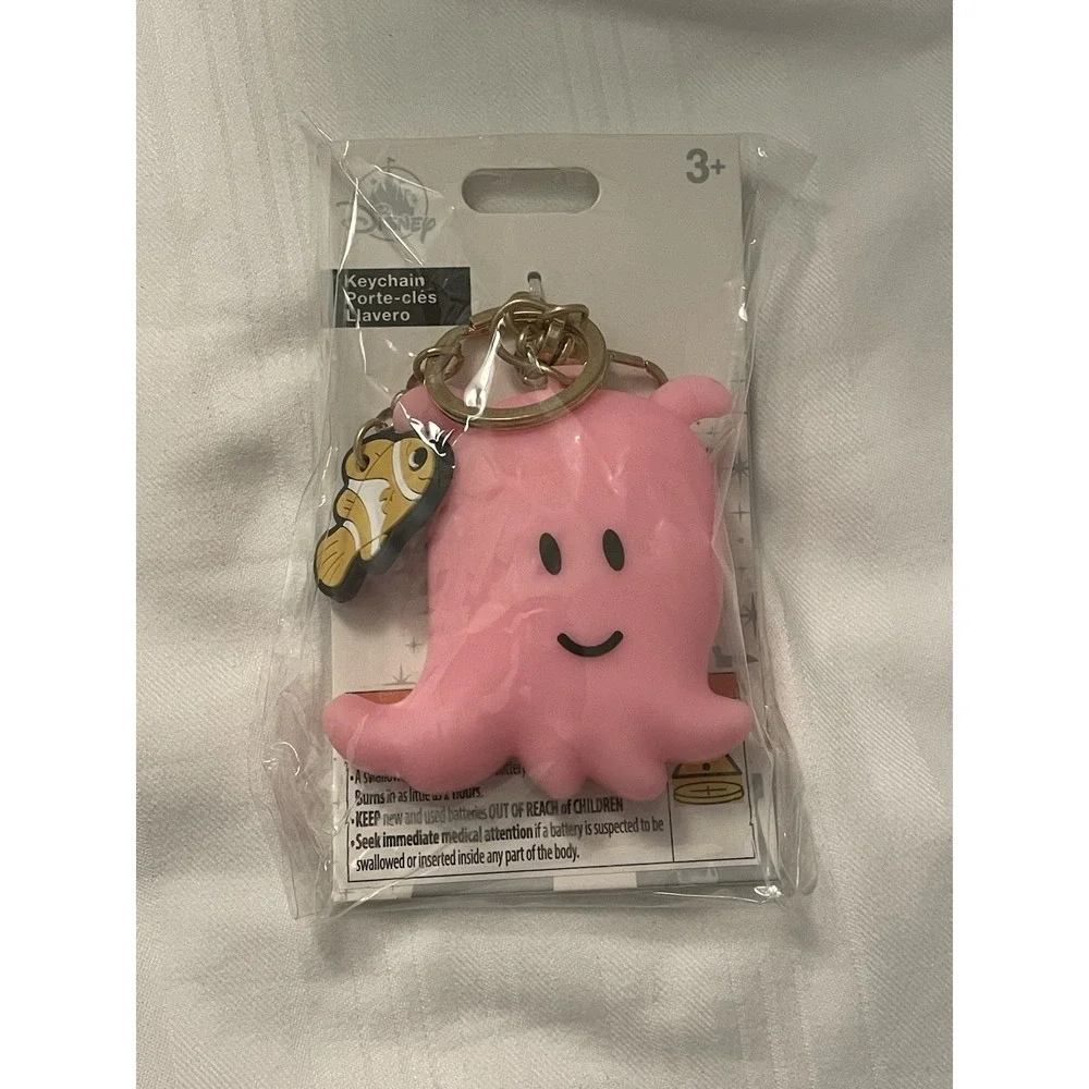 NEW Walt Disney Parks Finding Nemo Light-Up Pearl & Nemo Keychain Bag Charm